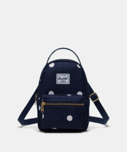 Modrá puntíkovaná crossbody kabelka Herschel Supply